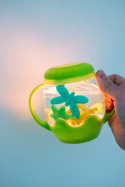 Mini jarre sensorielle verte avec 5 formes en silicone – Glo Pals
